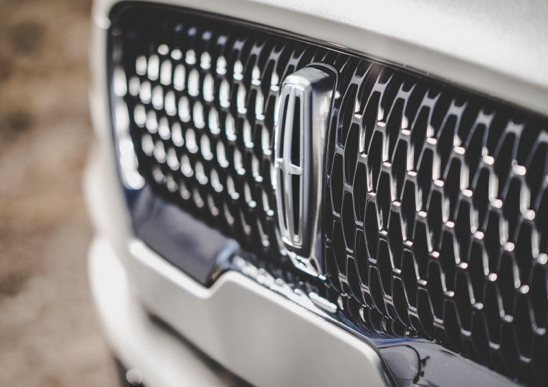 The grille of the 2024 Lincoln Aviator® Reserve model with an eye-catching repeated field of Lincoln Star logo shapes | Boulevard Lincoln in Georgetown DE