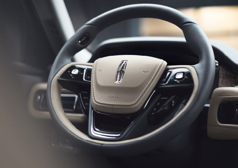 The intuitively placed controls of the steering wheel on a 2024 Lincoln Aviator® SUV | Boulevard Lincoln in Georgetown DE