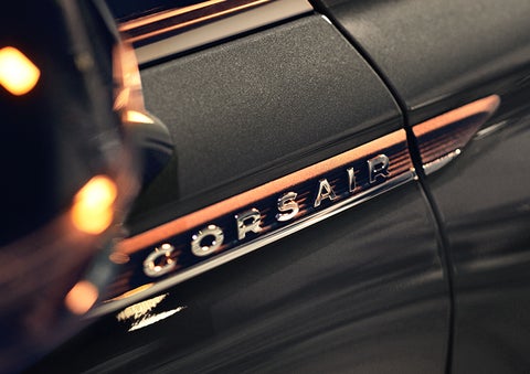 The stylish chrome badge reading “CORSAIR” is shown on the exterior of the vehicle. | Boulevard Lincoln in Georgetown DE