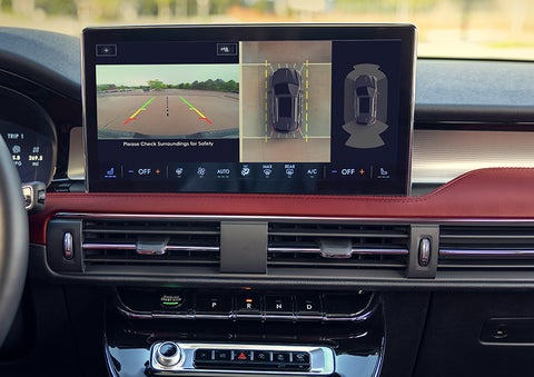 The driver of a 2024 Lincoln Corsair® SUV is shown selecting the drive mode. | Boulevard Lincoln in Georgetown DE