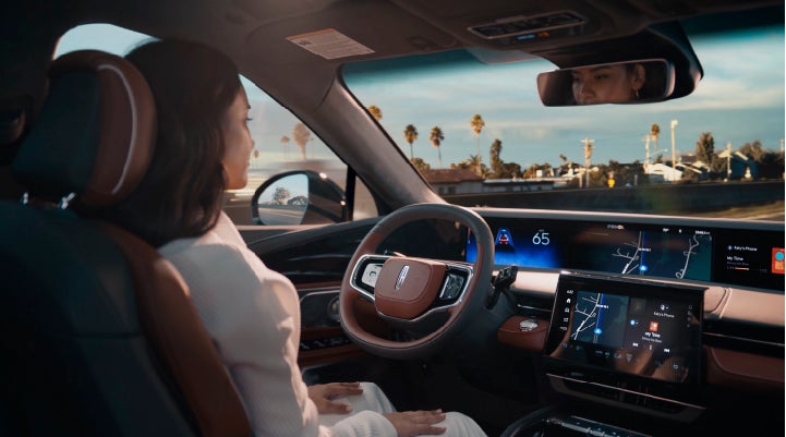 A person is shown driving hands-free on the highway with available Lincoln BlueCruise technology. | Boulevard Lincoln in Georgetown DE